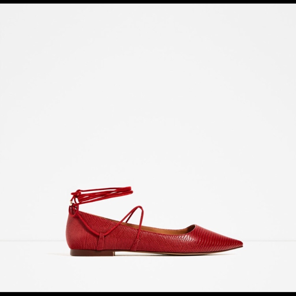 Embossed lace-up ballet flats.